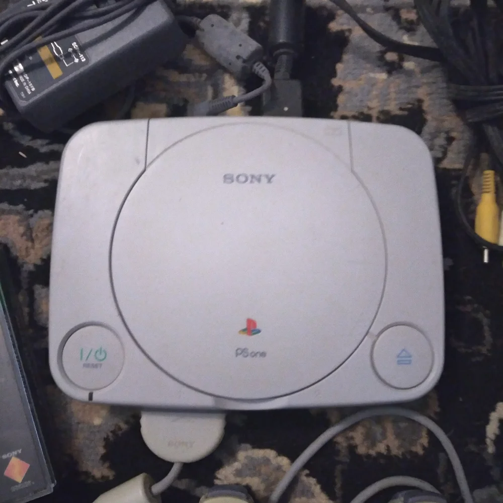 Sony PSone Mini Console with original controller and cables +FREE game